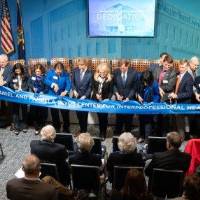 Donors cutting the ribbon at DCIH dedication